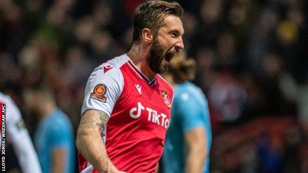 Ollie Palmer celebrates after scoring for Wrexham