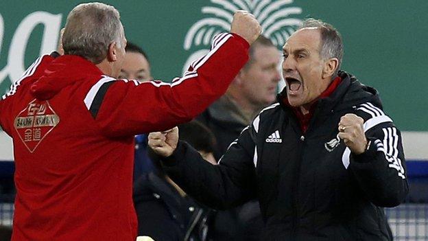 Francesco Guidolin (right) and Alan Curtis celebrate