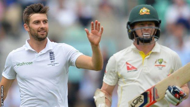 Mark Wood (left) took the wicket of Chris Rogers (right)