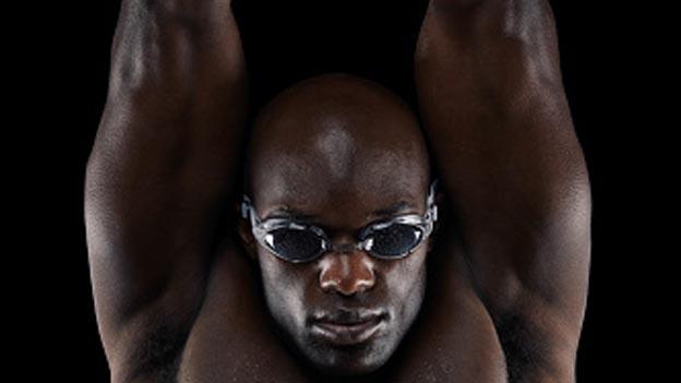 A man in swimming goggles