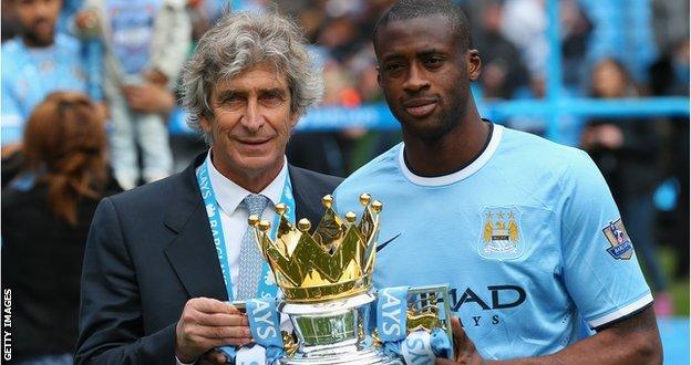 Manchester City manager Manuel Pellegrini and Yaya Toure