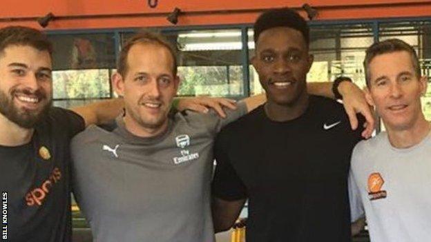 Bill Knowles (pictured far right) with Arsenal and England striker Danny Welbeck in November 2016