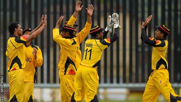 Papua New Guinea celebrate a wicket against Jersey