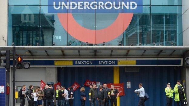 RMT members holding a picket outside Brixton Underground station