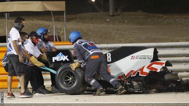 Romain Grosjean car is taking away