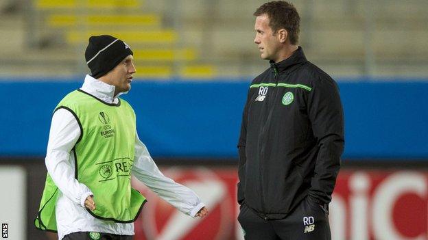 Kris Commons (left) and Ronny Deila