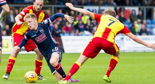 Thistle's Blair Spittal tackles Ross County's Davis Keillor-Dunn