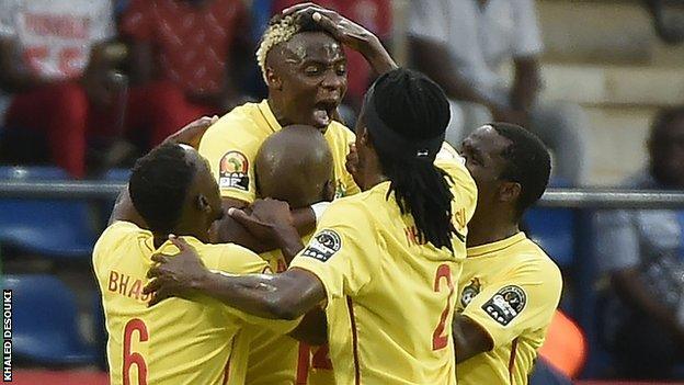 Zimbabwe celebrate after scoring against Algeria