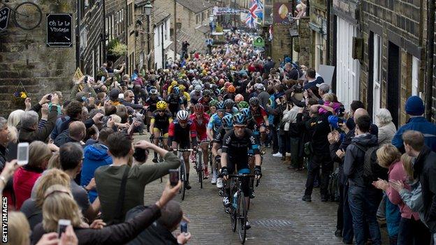 The peloton rides through Haworth