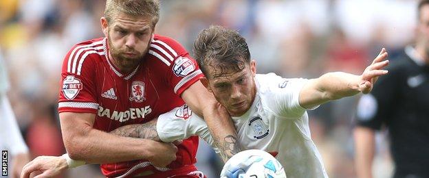 Middlesbrough's Adam Clayton (right) and Preston North End's Joe Garner battle for the ball