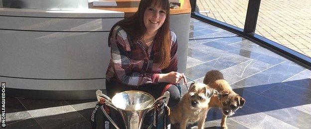 Ruth with her dogs Lou and Sid and the National League North Champions Trophy