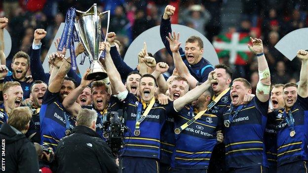 Leinster players celebrates with the trophy after beating Racing 92 in the 2018 European Champions Cup final