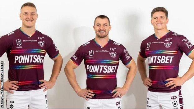 Manly players model the pride jersey