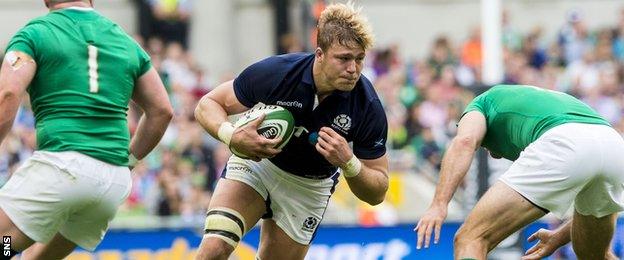 Dave Denton carries for Scotland