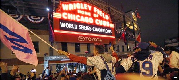 Cubs fans gather outside Wrigley Field