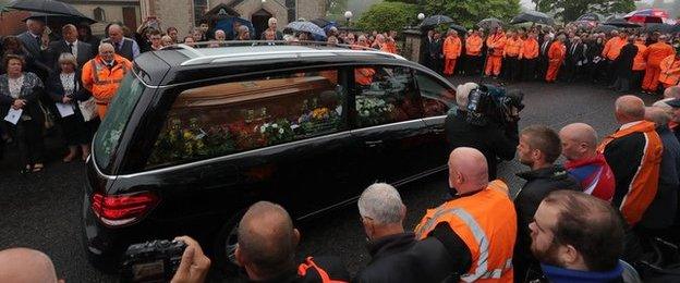 The funeral cortege arrives at Garryduff Presbyterian Church for William Dunlop's funeral