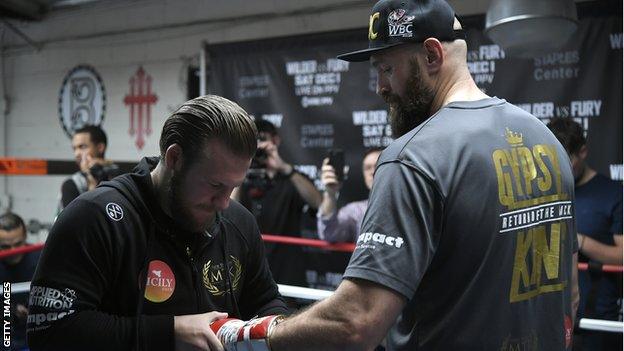 Ben Davison (left) made it clear he will still train and guide Fury on 1 December