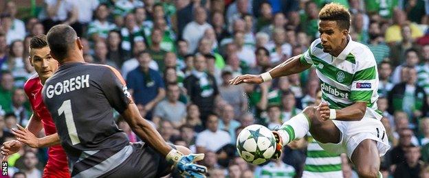 Hapoel Beer Sheva goalkeeper David Goresh challenges Scott Sinclair