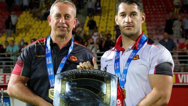 Steve McNamara and Ben Garcia with the shield