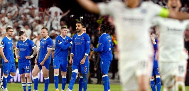 Rangers players are dejected after losing the penalty shoot out following the UEFA Europa League Final at the Estadio Ramon Sanchez-Pizjuan, Seville