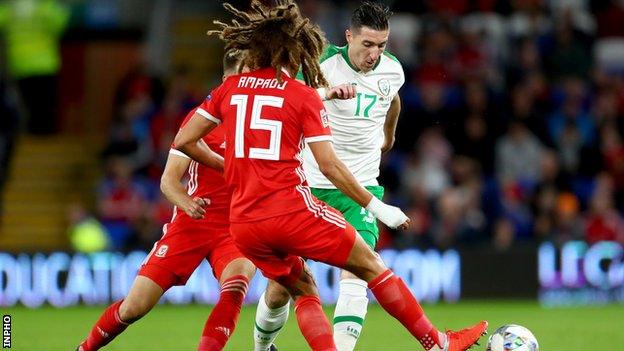 Stephen Ward battles with Wales' Ethan Ampadu in last Thursday's Nations League opener in Cardiff