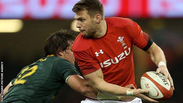 Dan Biggar prepares to pass the ball in Wales' match against South Africa in December 2017