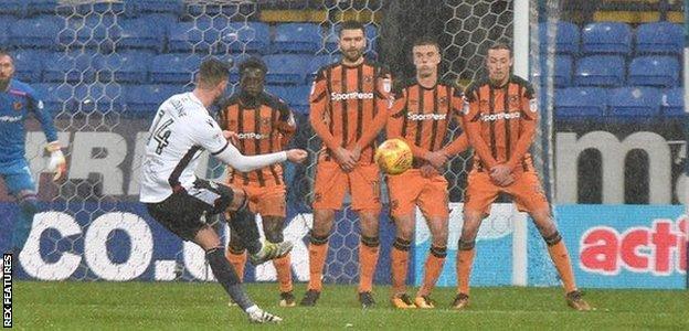 Bolton's Gary Madine scores a free-kick against Hull City