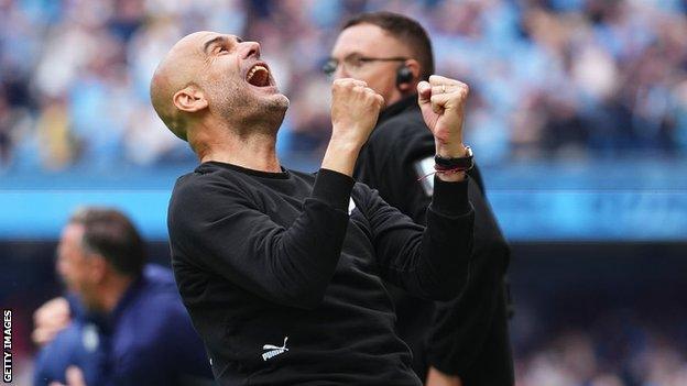 Pep Guardiola celebrates winning the Premier League