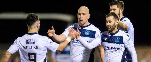 Dundee's Danny Mullen, Charlie Adam and Niall McGinn celebrate
