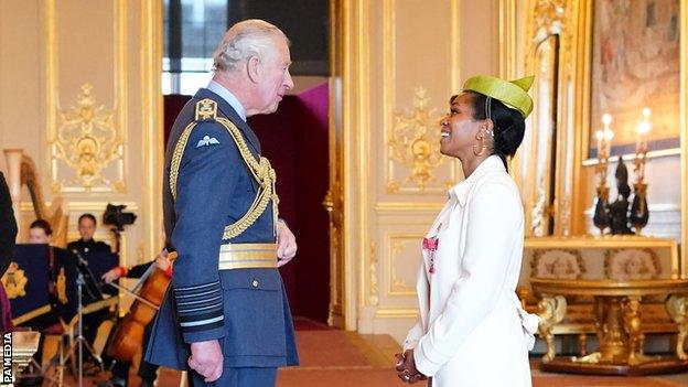 Ebony Rainford-Brent receives MBE from Prince Charles