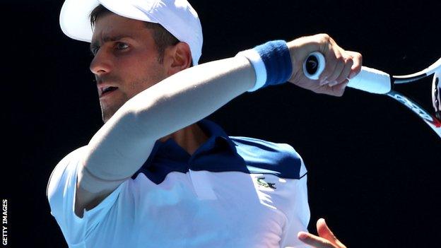 Novak Djokovic playing against Donald Young in the Australian Open