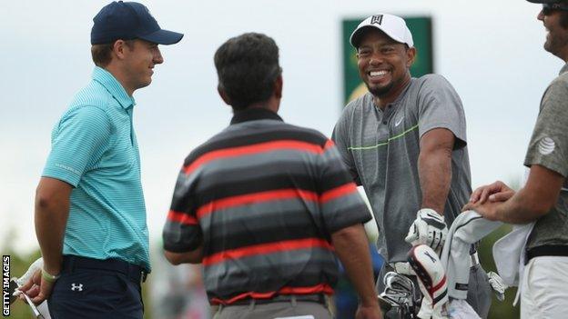 Tiger Woods (right)