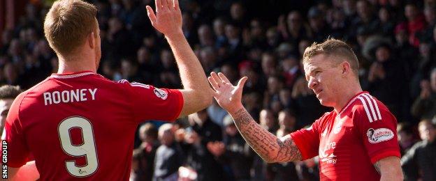 Adam Rooney congratulates Jonny Hayes