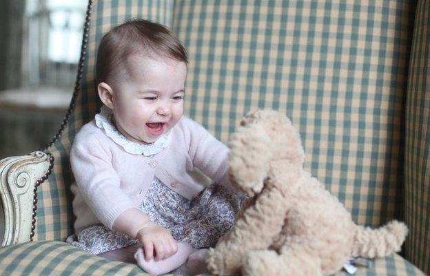 Princess-Charlotte-plays-with-toy-dog