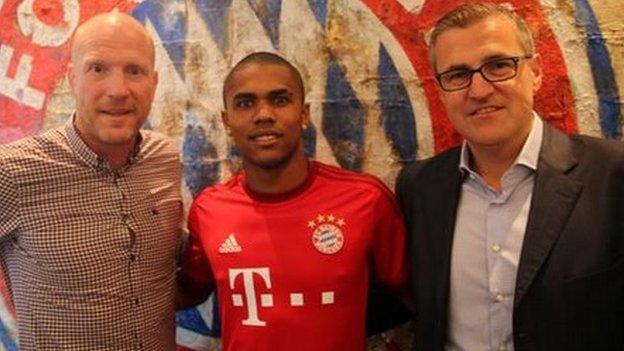 Matthias Sammer and Douglas Costa