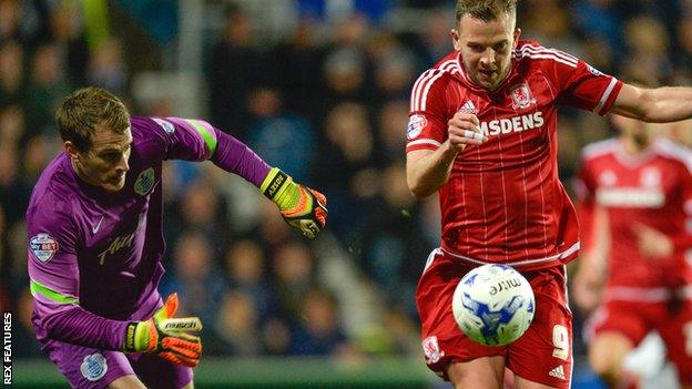 Middlesbrough striker Jordan Rhodes gets past QPR keeper Alex Smithies