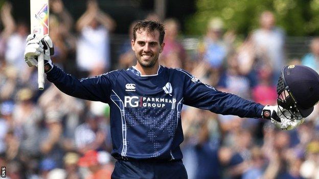 Calum MacLeod celebrates his century against England