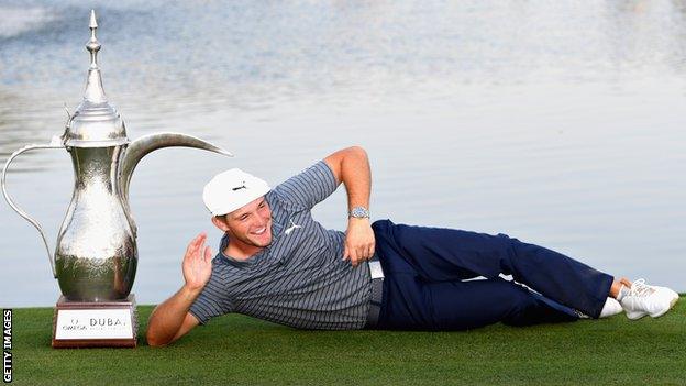 Bryson DeChambeau celebrates