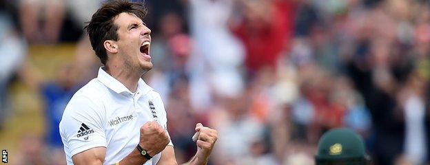 Steven Finn celebrates a wicket