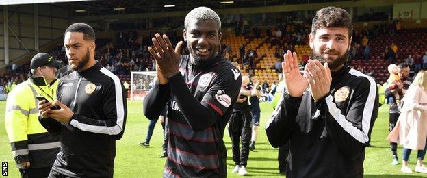 Charles Dunne, Cedric Kipre and Nadir Ciftci applaud the Motherwell supporters