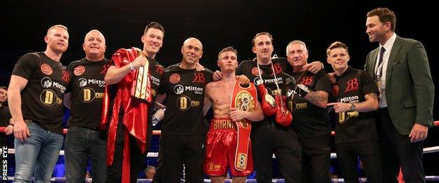 Ryan Burnett celebrates with the Matchroom team after his world title triumph