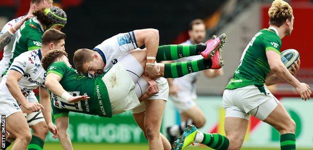 Bristol centre Sam Bedlow tackles London Irish centre Theo Brophy Clews