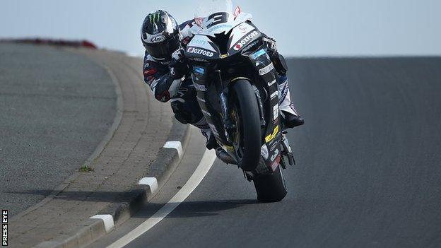 Michael Dunlop pulls a 'wheelie' at Black's Hill on his way to setting the fastest Superbike time in practice