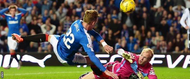 Dean Shiels bundled in a third after his initial shot was saved by Mark Ridgers