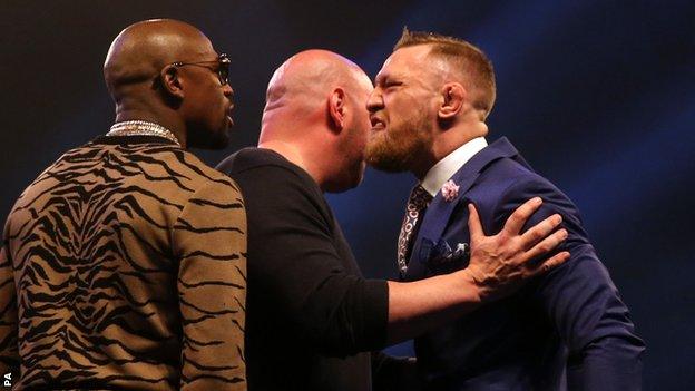 Connor McGregor and Floyd Mayweather during the press conference at the SSE Arena, Wembley