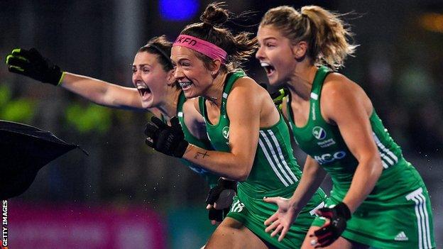 Roisin Upton (left), Bethany Barr (centre) and Chloe Watkins (right) celebrate Ireland's qualification for the Tokyo Olympics