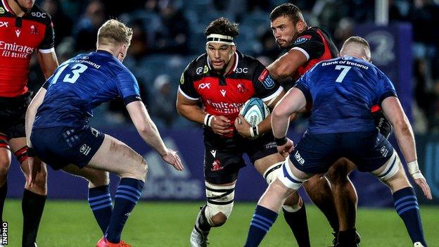 PJ Steenkamp of Lions in action against Leinster's Dan Leavy and Jamie Osbourne