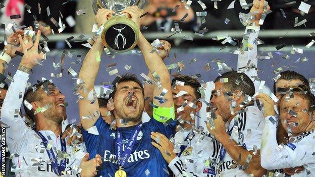 Real Madrid celebrate their 2014 Super Cup win in Cardiff