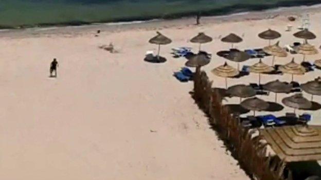 Still from footage showing Tunisian gunman on the beach