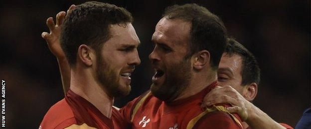 George North and Jamie Roberts celebrate against Scotland